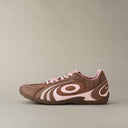 Brown and pink sneaker on a beige background with HelloKitty charm lightweight y2k retro shoes old order 
