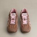 Brown and pink sneaker on a beige background with HelloKitty charm lightweight y2k retro shoes old order 
